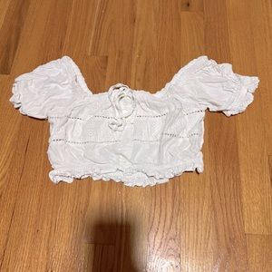 Sim and Sam cropped white off the shoulder top